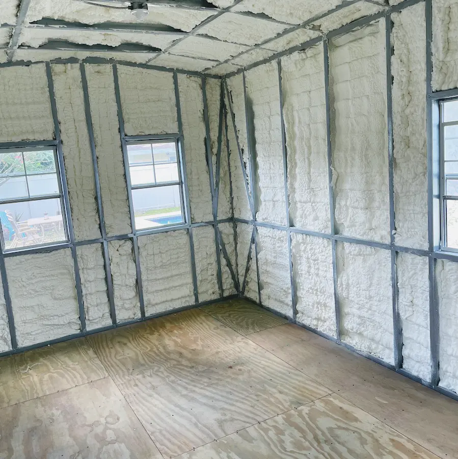 Closed-cell spray foam insulation applied to wall cavities in a residential project in San Juan